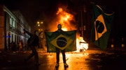 More than , people were in the streets Monday for largely peaceful protests in at least eight big cities.